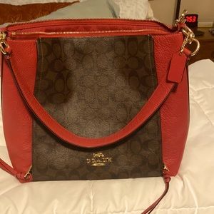 Red and brown coach bag